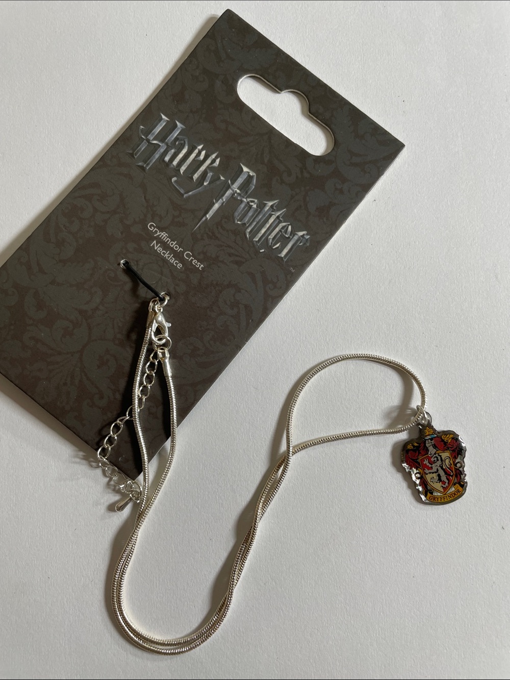 Harry Potter Kids Gryffindor Crest Necklace — Silver with Red Accent 8+